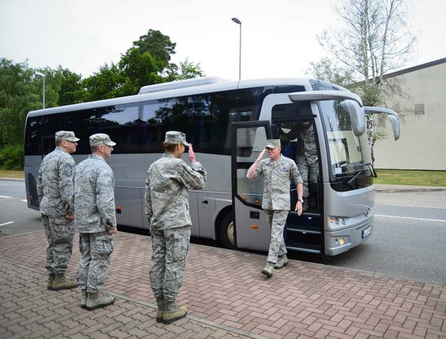Photos by Tech. Sgt. Daylena S. Ricks  Col. Andra Kniep, 435th Air Ground Operations Wing and 435th Air Expeditionary Wing commander, greets Chief Master Sgt. of the Air Force James A. Cody during his visit June 22 on Ramstein.  Cody received a hands-on tour of the AGOW’s facilities and the wing’s mission brief. 