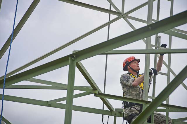 Chief Master Sgt. of the Air Force James A. Cody climbs an antenna tower June 22 on Ramstein. Cody performed a tower climb with Airmen from the 1st CMXS during his 435th Air Ground Operations Wing immersion tour.  