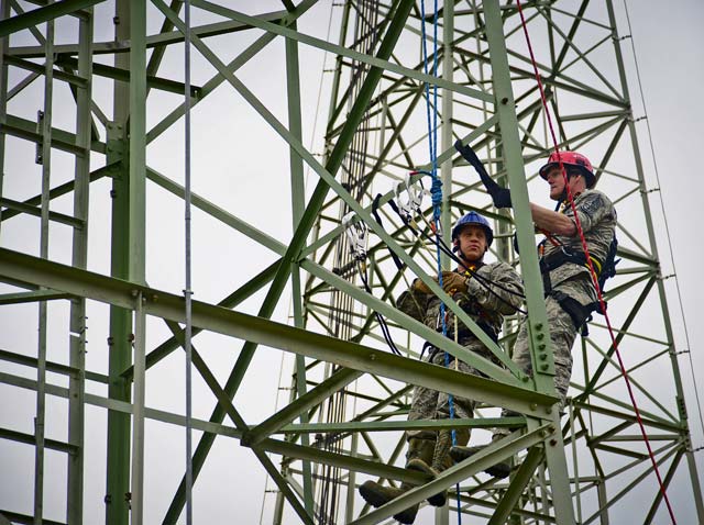 Chief Master Sgt. of the Air Force James A. Cody and Staff Sgt. Daniel Peters, 1st Communications Maintenance Squadron cable and antenna theater maintenance supervisor, climb an antenna tower together June 22 on Ramstein. Cody performed a tower climb with Airmen from the 1st CMXS during his 435th Air Ground Operations Wing immersion tour. 