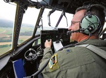 Brig. Gen. Patrick X. Mordente, overlooks a river region near Ramstein during his final flight aboard a C-130J Super Hercules June 10. Mordente, after completing his command tour on Ramstein, has been selected to serve as the 18th Air Force vice commander at Scott Air Force Base, Ill.