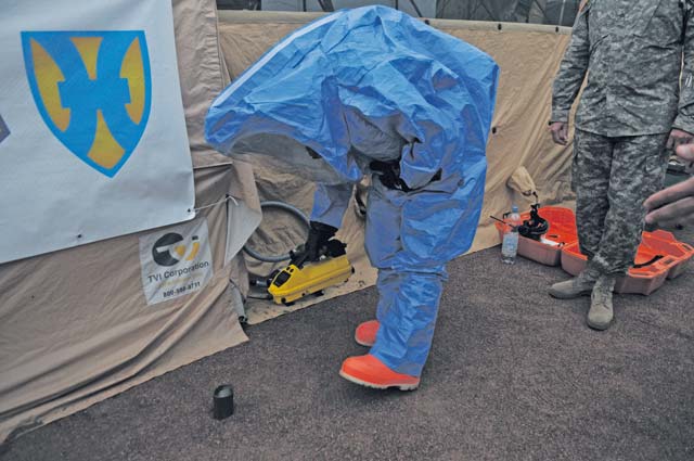 Photo by 221st Public Affairs Detachment A Soldier from the 773rd Civil Support Team, a subordinate unit of the 7th Civil Support Command, 21st Theater Sustainment Command, demonstrates how to test for a contamination during the 32nd Rheinland-Pfalz Tag June 26 on Ramstein.