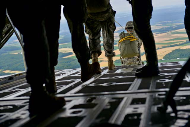 Photo by Airman 1st Class Lane T. Plummer Paratroopers exit a C-130J Super Hercules during International Jump Week July 9 on Ramstein. The 435th Contingency Response Group invited nine allied nations to participate in International Jump Week to boost camaraderie and learn how to work together. 