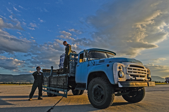 Airmen assigned to the 37th Airlift Squadron unload cargo from a truck before loading it onto a C-130J Super Hercules in Plovdiv, Bulgaria, July 15. During the bilateral exercise, Airmen from the 37th AS are scheduled to drop more than 25 container delivery systems over Plovdiv.