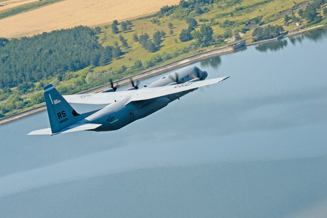 An 86th Airlift Wing C-130J Super Hercules flies over Plovdiv, Bulgaria, July 13. The 37th Airlift Squadron is participating in bilateral training with the Bulgarian air force during their deployment to Plovdiv.