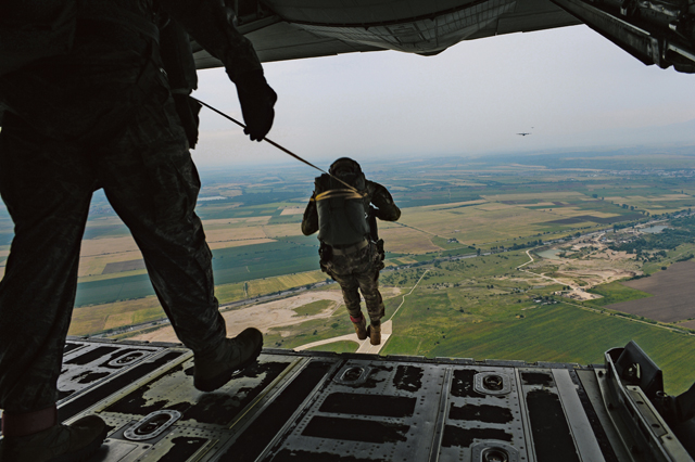 U.S. Air Force jumpmasters exit a C-130J Super Hercules from the 37th Airlift Squadron during a static-line jump over Plovdiv, Bulgaria, July 14. Approximately 10 jumpmasters from Ramstein and more than 50 Bulgarian air force paratroopers jumped during the formation flight. This flight was one of many that showcased the U.S. and Bulgarian partnership during their two-week deployment to Plovdiv.