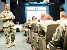 Sgt. 1st Class Patrick B. Marrill, a 21st Theater Sustainment Command Noncommissioned Officer Evaluation Report trainer, instructs leaders from units throughout the U.S. Army Garrison on the new Army NCOER July 15 on Kapaun Air Station.