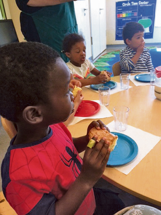 "Peer pressure" trying new foods with your toddler works well when done as a group.