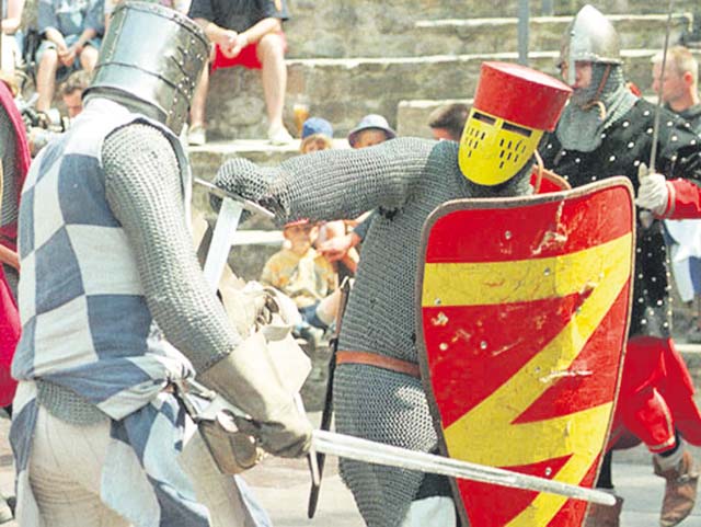 Courtesy photos Knights present show fights during the medieval fest Saturday and Sunday at Falkenstein Castle.