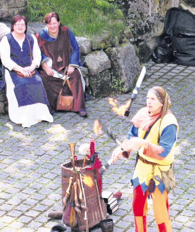 Jugglers present their skills during the medieval spectacle Saturday and Sunday at Falkenstein Castle.