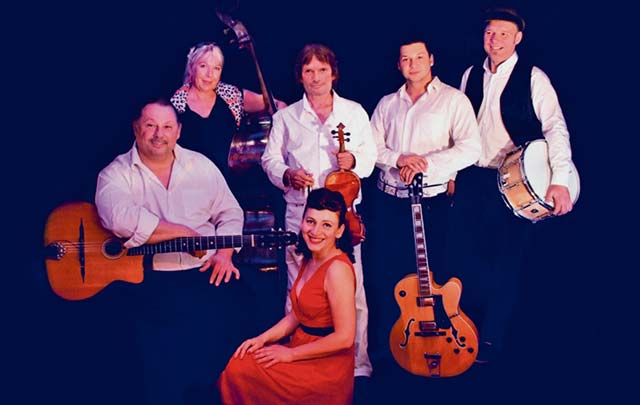 The Jaworek-Reinhardt Ensemble, with singer Ms. Djulia from Russia, perform Sinti jazz as well as French musette, Hungarian folk and Latin American rhythms, July 24 during the Burg Jazz music festival at Nanstein Castle.
