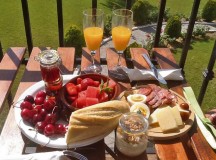 Make the most of the market by creating a gourmet picnic brunch: Cured meats, yogurt, hard boiled eggs, bread, honey, jam and fresh fruit and juice.