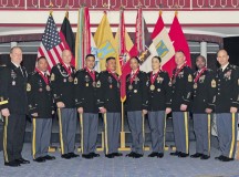 Maj. Gen. Duane A. Gamble (left) and Command Sgt. Maj. Rodney J. Rhoades, commanding general and senior enlisted leader of the 21st Theater Sustainment Command respectively (right), stand with newly inducted members and honorary members of the Sergeant Morales Club following a ceremony July 31 at the Armstrong’s Club on Vogelweh.