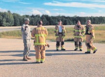 Photos by Staff Sgt. Jerry Boffen
Capt. Matthew D. Pride, lead planner for exercise Swift Response 15, Joint Multinational Readiness Center, discusses safety plans with German firefighters prior to testing the recently resurfaced and extended short takeoff and landing strip at Hohenfels.
