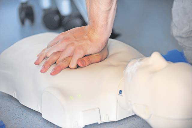 A participant practices CPR techniques during a lifeguard training course Aug. 12 on Ramstein. The course also included instruction on first aid, drowning victim rescue and automated external defibrillator training.
