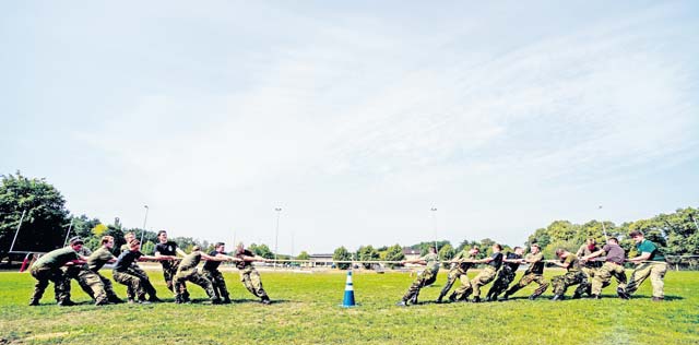 Royal Air Force Air Training Corps cadets participate in tug-of-war after an obstacle course Aug. 10 on Vogelweh. After the tug-of-war against each other, they defeated the Kisling NCO Academy instructors in the final round.