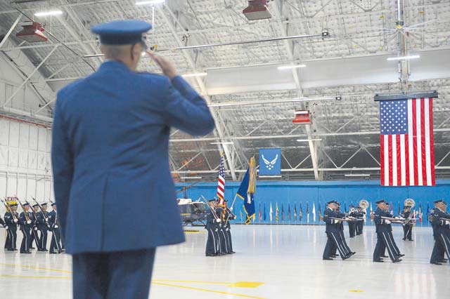 Photos by Scott M. Ash Air Force Vice Chief of Staff Gen. Larry O. Spencer salutes during a pass in review procession at his retirement ceremony Aug. 7 at Joint Base Andrews, Md.