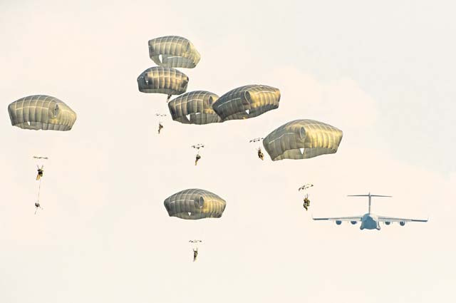 Multinational paratroopers jump from a C-17 Globemaster III as part of exercise Allied Spirit II Aug. 13 at the U.S. Army’s Hohenfels Training Area in Germany.