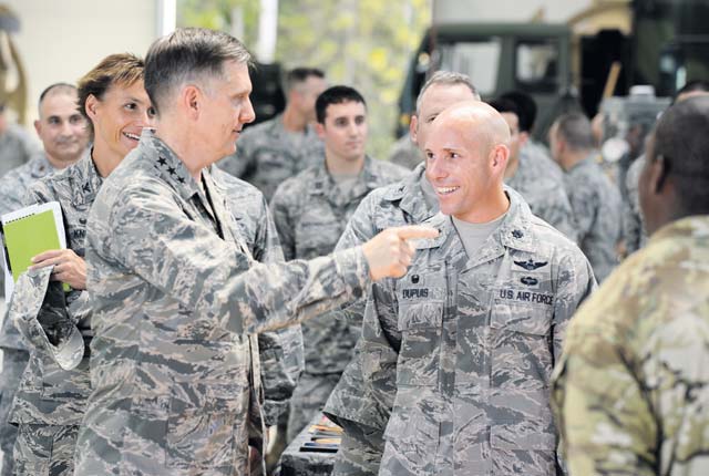 Photo by Staff Sgt. Armando A. Schwier-Morales Members of the 435th Air Ground Operations Wing listen to Lt. Gen. Timothy Ray, 3rd Air Force commander, during an immersion tour Aug. 6 on Ramstein.