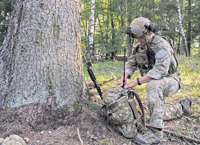 U.S. Air Force Staff Sgt. Seth Hunt, 2nd Air Support Operations Squadron tactical air control party, goes through his bag while participating in the exercise Allied Spirit II Aug. 13 at the U.S. Army’s Hohenfels Training Area in Germany.