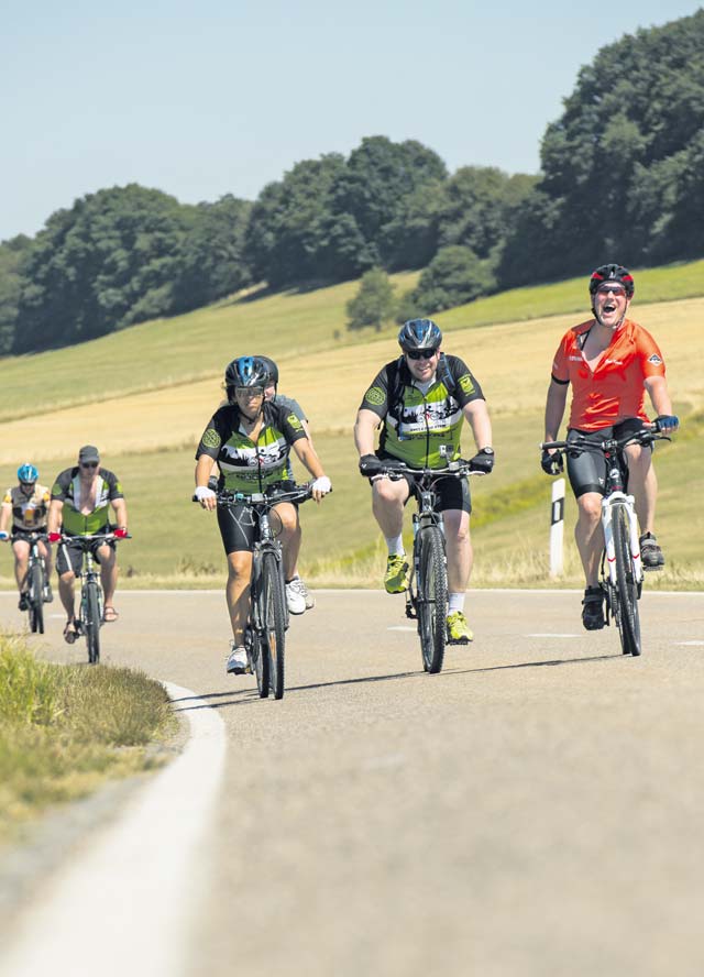 Cyclists from the KMC travel back after riding for three days Aug. 1 in Germany. 