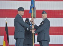 Brig. Gen. Jon T. Thomas, 86th Airlift Wing commander, passes the guidon of the 86th Operations Group to Col. Gerald A. Donohue as he takes command of the group during the 86th OG change of command Aug. 5 on Ramstein. As commander of the 86th OG, Donohue will continue to support the 86th Airlift Wing’s mission by providing full spectrum airlift operations.