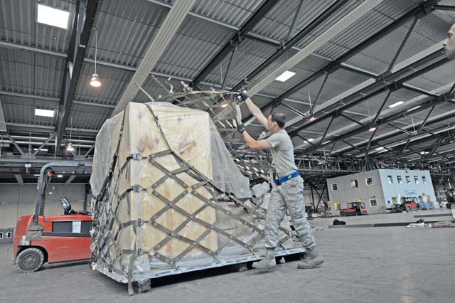 Airman 1st Class Jakob Nance, 435th Contin-gency Response Group mobile aerial porter, participates in the cargo pallet buildup portion of the 2015 Ramstein Air Base Rodeo Aug. 1 on Ramstein. The event is a competition aimed at showcasing the skills of the air transportation career field. The 435th CRG team placed first in the obstacle course event.