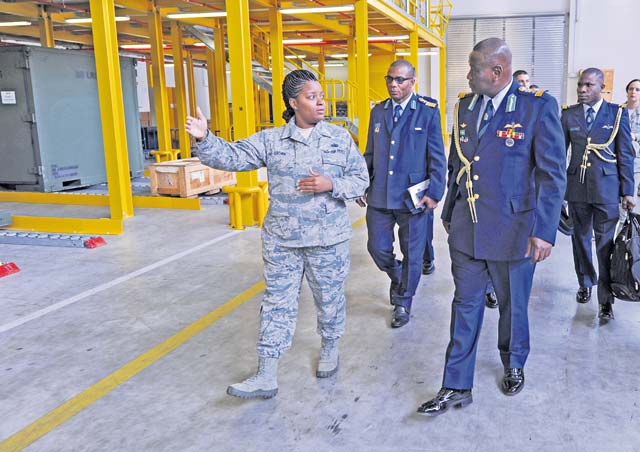 Tech. Sgt. Stephanie Brown, 86th Logistics Readiness Squadron aircraft parts store NCOIC, briefs members of the Ghanaian air force during a tour Aug. 18 on Ramstein. The 435th Contingency Response Group and the 86th LRS provided the tour to inform partner nations on key areas of maintaining airlift fleets.