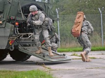 Photo by Staff Sgt. Warren W. Wright Jr.
Competitors from the 2nd Cavalry Regiment dismount a Stryker combat vehicle during a medical scenario exercise conducted as part of the 2015 European Best Warrior Competition 
Sept. 15 at the Grafenwoehr Training Area. About 22 candidates participated in the intense, annual weeklong competition, the most prestigious competitive event of the region. In the end, only one junior officer, one NCO and one Soldier emerged as “Best Warriors.”