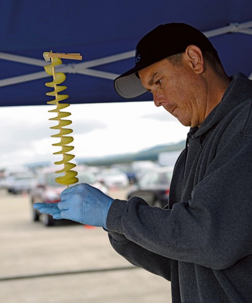Tech. Sgt. Robert Campbell, 721st Aircraft Maintenance Squadron, prepares a spiral potato for a patron of the Ramstein Bazaar Sept. 19 on Ramstein. Along with German vendors, base organizations and booster clubs were allowed to set up at the bazaar to provide information about their services and sell food items.