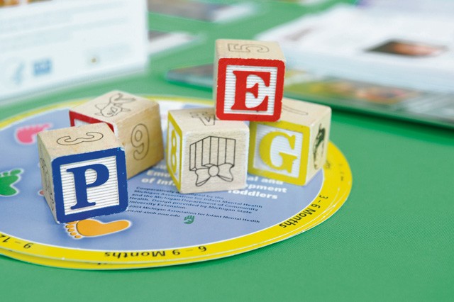 Building blocks are displayed on the Educational and Developmental Intervention Services information booth at the Ready and Resilient information fair. The fair had agencies such as the American Red Cross, USO, Army Sexual Harassment Assault Response and Prevention, Air Force Sexual Assault Prevention and Response and the Army Community Service available to provide information to attendees.