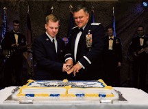 Airman Ryan Darish, 86th Medical Support Squadron uniform business office technician, and Gen. Frank Gorenc, U.S. Air Forces in Europe and Air Forces Africa commander, cut a cake during the Air Force Ball Sept. 12 on Ramstein. The cake-cutting ceremony is an Air Force tradition in which the lowest and highest ranking Airmen in the room cut the cake together.