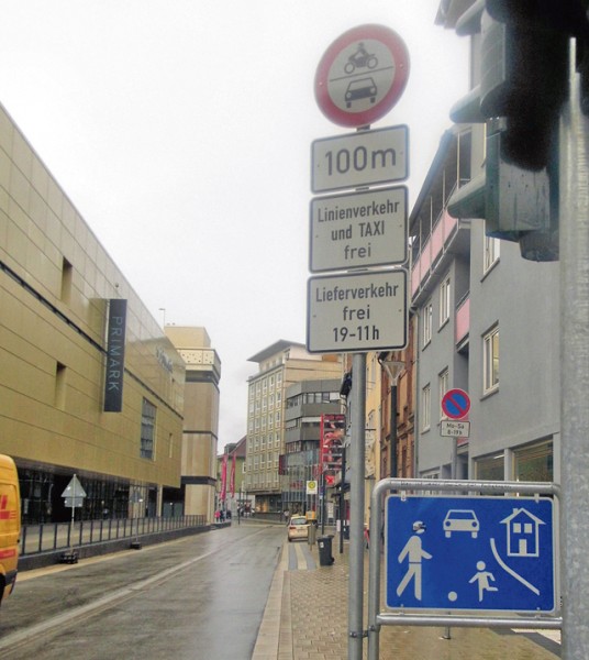 Traffic sign No. 260 with the motorcycle and car in the white circle with the red border prohibits drivers to enter Fruchthallstrasse.