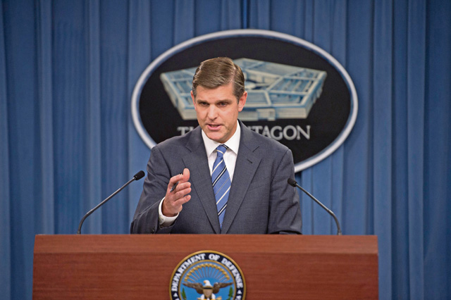 Photo by Senior Master Sgt. Adrian Cadiz Pentagon Press Secretary Peter Cook briefs reporters Sept. 8 at the Pentagon.