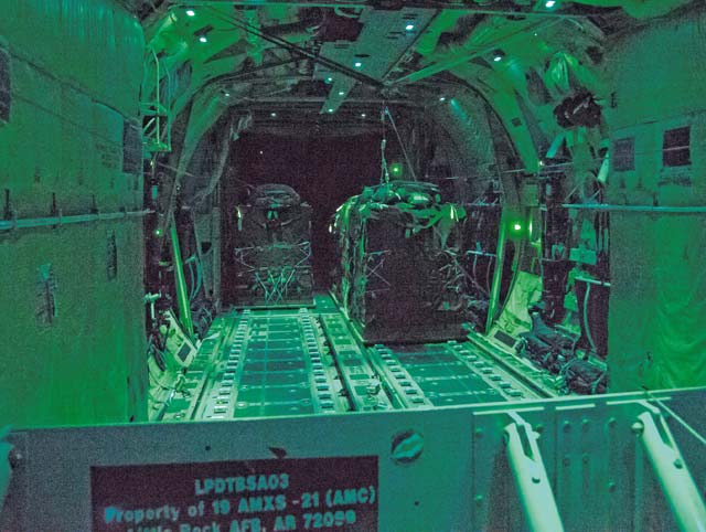 Photo by Senior Airman Jonathan Stefanko Cargo exits a C-130J Super Hercules Aug. 25 above Romania as part of exercise Swift Response.