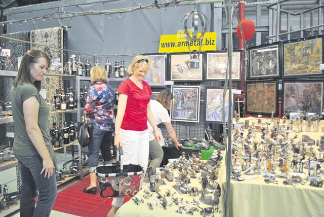 Courtesy photo Shoppers check out items offered at the Ramstein Bazaar in September 2014.