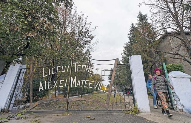 Moldovan students leave Liceul Teoretic Alexei Mateevici School for the day Oct. 19 in Sanatauca, Moldova. Airmen from the 435th Construction and Training Squadron and the 52nd Civil Engineer Squadron have been working on renovations to a gymnasium locker room at the school since Sept. 23. The Moldova Humanitarian and Civic Assistance program is part of a military and civilian theater security cooperation program the U.S. European Command uses to directly impact civilian communities throughout 17 countries, primarily in Eastern Europe. In addition to allowing service members the opportunity to further their skill sets on the construction site, HCA projects also promote increased bonds and trust for future operations and improvement between the U.S. and partnered nations.