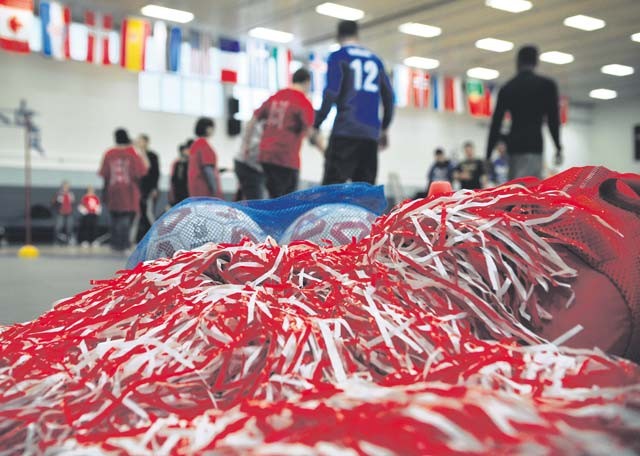 Soccer equipment and pompoms lie on the floor during the KMC Adaptive Sports soccer event Oct. 15 on Vogelweh. Students from Ramstein and Vogelweh middle and high schools came together for a friendly soccer competition to build camaraderie and morale.