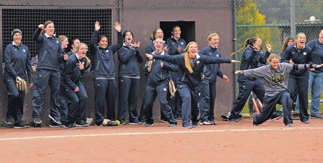 Members of the University of Notre Dame softball team celebrate during a scrimmage against the Ramstein Lady Rams Oct. 21 on Ramstein. The Lady Rams defeated the UND team by a score of 11-7. 