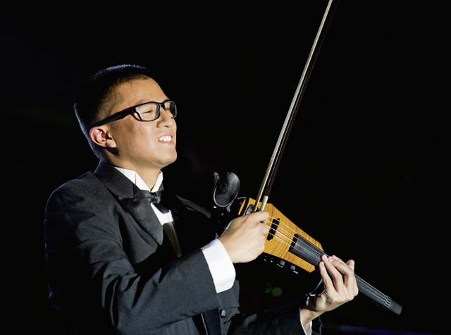 First Lt. Oliver Chang plays a violin during a Tops in Blue concert Sept. 27 on Ramstein.