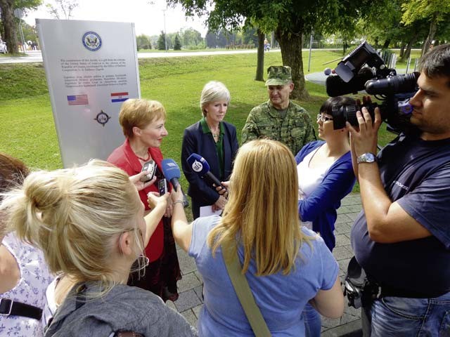 Courtesy photo (Left to right) Local media conducts interviews Sept. 17 with Deputy Mayor of Karlovac Marina Kolakovic, U.S. Embassy Zagreb Deputy Chief of Mission (Charge d'Affaires) Margaret Nardi and the Commander of Croatian Land Forces Lt. Gen. Mate Ostovic in front of the sign that dedicates the contribution the United States European Command has made through their Humanitarian Assistance program.