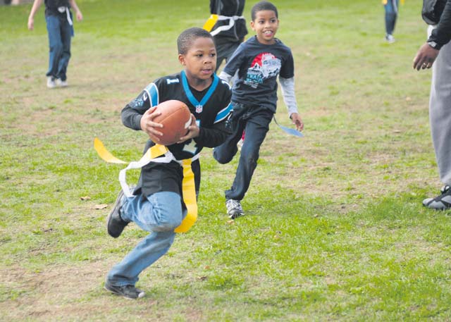 Children of Soldiers assigned to the 21st Theater Sustainment Command’s Special Troops Battalion play a game of flag football during a STB Fall Festival Sept. 26 on Daenner Kaserne.