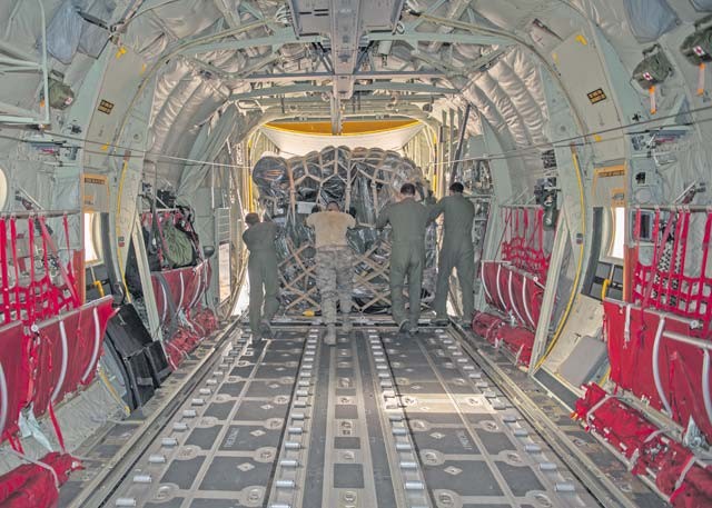 Deployed Airmen from the 435th Contingency Response Group unload cargo from a C-130J Super Hercules Sept. 15 at Diyarbakir Air Base, Turkey. The 435th CRG is made up of 29 Air Force Specialty Codes including loadmasters and aircrew support staff. The group has deployed approximately 80 Airmen to set up initial life support and operation facilities for the bed-down of U.S. Air Forces Central Command’s personnel recovery forces supporting Operation Inherent Resolve.