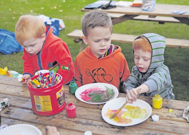 Children of Soldiers assigned to the 21st Theater Sustainment Command’s Special Troops Battalion participate in arts and crafts during a STB Fall Festival Sept. 26 on Daenner Kaserne.
