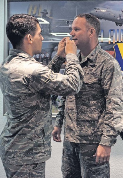  Maj. Gen. Duane A. Gamble, commanding general of the 21st Theater Sustainment Command (left photo), and Brig. Gen. Jon T. Thomas, 86th Airlift Wing commander, receive their annual flu vaccinations. According to the U.S. Army Public Health Command, the flu virus strikes 5 to 20 percent of the U.S. population and claims 36,000 lives yearly. Vaccination opportunities are being offered by various medical agencies throughout the KMC. Personnel should check with their medical personnel or primary care provider for times and locations.
