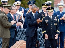 Photo by Sgt.1st Class Clydell Kinchen
President Barack Obama, Secretary of Defense Ash Carter and Marine Gen. Joseph F. Dunford Jr., the new chairman, applaud outgoing Chairman of the Joint Chiefs of Staff Army Gen. Martin E. Dempsey during the change of responsibility ceremony at Summerall Field on Joint Base Myer-Henderson Hall in Arlington, Va., Sept. 25.