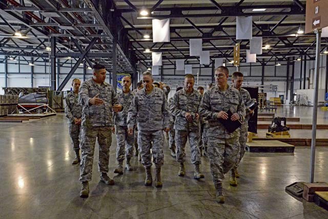 Maj. Gen. Frederick H. "Rick" Martin, U.S. Air Force Expeditionary Center commander, takes a tour of the 721st Aerial Port Squadron Oct. 13 on Ramstein. During his visit, Martin toured different units from the 521st Air Mobility Operations Wing and spoke during an all-call.
