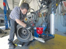 Ryan Dyle, Ramstein Auto Skills Center mobile equipment servicer, replaces a summer tire for a winter tire Oct. 1 on Ramstein. The auto center provides services to put winter tires on a vehicle or the space and equipment if one wishes to change their tires themselves.