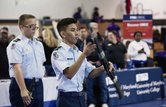 Members of the Ramstein Junior ROTC perform for an audience during the Red Ribbon Run Superhero 5K event.