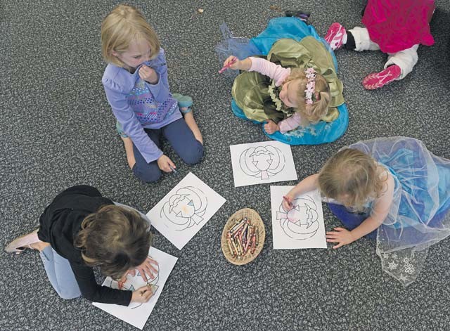 KMC children color in a pumpkin during Ramstein Library’s "Spooky Story Time" Oct. 29.