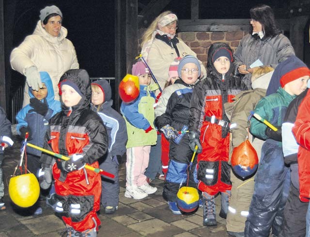 Photo by Christine June Children with handcrafted lanterns walk in lantern processions to honor St. Martin.